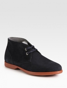 Rich suede lace-up with an ankle-high profile and contrast brick sole.Suede upperSuede liningPadded insoleRubber soleMade in Italy Rich suede lace-up with an ankle-high profile and contrast brick sole.Suede upperSuede liningPadded insoleRubber soleMade in Italy