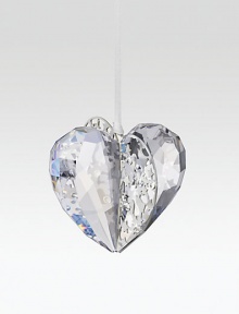 An innovative technique cleverly combines faceted crystal with pierced silvertone metal in a graceful, shimmery design to add dazzle to any tree.CrystalSilvertoneAbout 2H X 2.75WMade in Austria An innovative technique cleverly combines faceted crystal with pierced silvertone metal in a graceful, shimmery design to add dazzle to any tree.CrystalSilvertoneAbout 2H X 2.75WMade in Austria