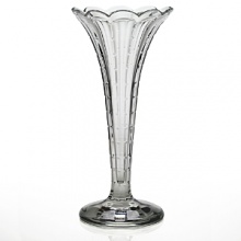 Made entirely from hand, each piece of William Yeoward Crystal draws its inspiration from antique crystal pieces originally made in England during the 18th and early 19th centuries. Small, flat cuts run from the base to the scalloped rim of this delicate vase. Made entirely from hand, each piece of William Yeoward Crystal draws its inspiration from antique crystal pieces originally made in England during the 18th and early 19th centuries. Small, flat cuts run from the base to the scalloped rim of this delicate vase.