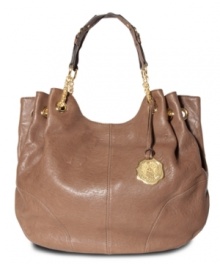 Poised and practical, this slouchy silhouette from Vince Camuto offers a touch of elegance to any ensemble. Luxurious leather is elegantly accented with custom hardware and chain-link stations at the straps, while the spacious interior provides plenty of pockets for the everyday essentials. Poised and practical, this slouchy silhouette from Vince Camuto offers a touch of elegance to any ensemble. Luxurious leather is elegantly accented with custom hardware and chain-link stations at the straps, while the spacious interior provides plenty of pockets for the everyday essentials.