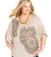 Make a dramatic statement with Style&co.'s butterfly sleeve plus size top, finished by an embellished burnout-print.