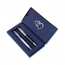 A romantic pairing in white pearl and anthracite from Swarovski makes the perfect wedding gift in a handsome presentation box. A romantic pairing in white pearl and anthracite from Swarovski makes the perfect wedding gift in a handsome presentation box.