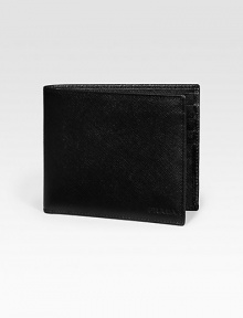 Saffiano leather wallet opens to eight credit card slots and two billfold compartments. Embossed Prada logo detail 4¼W X 3¾H Made in Italy Saffiano leather wallet opens to eight credit card slots and two billfold compartments. Embossed Prada logo detail 4¼W X 3¾H Made in Italy