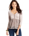 Pretty in lace: delicate tiers create romantic style on this baby doll top from American Rag.