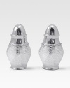 A handmade set of salt and pepper shakers in hammered, sandcast aluminum, buffed by hand for unparalleled shine and elegance. Set of 2 Each, 3½H X 1¾ diam. Sandcast aluminum Hand wash Imported 