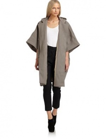 THE LOOKButton and toggle closuresWide dolman sleevesDual flap pocketsHooded backTHE FITAbout 38 from shoulder to hemTHE MATERIAL80% wool/20% nylonFully linedCARE & ORIGINDry cleanImportedModel shown is 5'10½ (179cm) wearing US size 4. THE LOOKButton and toggle closuresWide dolman sleevesDual flap pocketsHooded backTHE FITAbout 38 from shoulder to hemTHE MATERIAL80% wool/20% nylonFully linedCARE & ORIGINDry cleanImportedModel shown is 5'10½ (179cm) wearing US size 4.