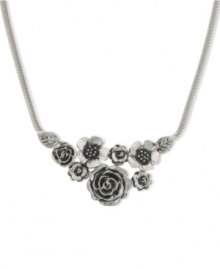 Pick some flowers this season. 2028's bib necklace features a bouquet of detailed floral pendants. Crafted in silver tone mixed metal. Approximate length: 16 inches + 3-inch extender. Approximate drop: 2-1/2 inches.