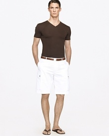 Tailored for a trim fit with modern proportions, a short-sleeved V-neck shirt exudes effortless appeal in lustrous fine-ribbed cotton. Tailored for a trim fit with modern proportions, a short-sleeved V-neck shirt exudes effortless appeal in lustrous fine-ribbed cotton.