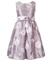 Flowery fashion. The muted colors on this soutache flower dress from Rare Editions give her an eye-catching, subtle style.