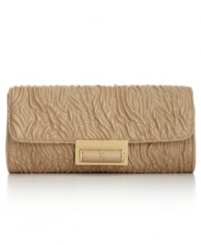 Petite and posh, this Ivanka Trump clutch is sized-right for chic soirees and other evening escapades. Faux luxe leather, discrete chain-link strap and sleek shape make it the ideal out-all-night accessory. Petite and posh, this Ivanka Trump clutch is sized-right for chic soirees and other evening escapades. Faux luxe leather, discrete chain-link strap and sleek shape make it the ideal out-all-night accessory.
