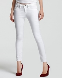 Resist the rules in these white rag & bone/JEAN capri pants. Boasting a sleek and skinny silhouette, the getaway-perfect style in complete with edgy zippers at the cuffs.