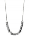 Fossil's necklace gets a something extra in the way of style. Crafted from silver-tone stainless steel, the necklace dazzles with sparkling accents and rounded beads. Approximate length: 16 inches + 2-inch extender.