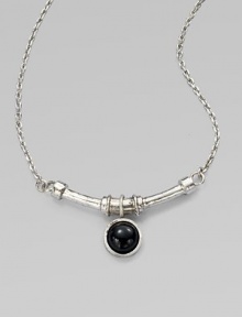 A single, glossy dome of black agate on a curved bar and a link chain. SilvertoneBlack agateLength, about 18Pendant size, about ½Lobster clasp closureMade in USA A single, glossy dome of black agate on a curved bar and a link chain. SilvertoneBlack agateLength, about 18Pendant size, about ½Lobster clasp closureMade in USA