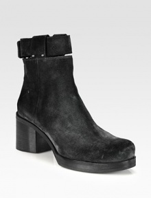 An urban-ready suede ankle boot with a towering stacked heel, exposed metal zipper and detachable ankle strap. Stacked heel, 2 (50mm)Stacked platform, ¾ (20mm)Compares to a 1¼ heel (30mm)Suede upperBack zip and detachable wrap-around strap with metal pull-tab closureLeather lining and solePadded insoleMade in Italy