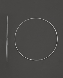 14 Kt. white gold hoop earrings with invisible closure. 14 Kt. white gold hoop earrings with invisible closure.