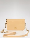 Obey urban instincts with Tory Burch's sleek black leather cross body. A marriage of uptown polish and downtown grit, this versatile bag comes out on days that don't end at dusk.