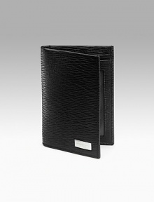 Stamped calfskin credit card holder has two card slots and one ID window. 3W X 4¼H Made in Italy Stamped calfskin credit card holder has two card slots and one ID window. 3W X 4¼H Made in Italy