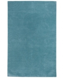 By using a centuries-old technique, craftsmen are able to produce the unique detail and texture of this plush wool rug from Surya's Mystique collection. They work traditional shuttles, then hand-carve and hand-finish the rug in pursuit of high quality and a flawless finish. In a rich spa blue, carved discs and spirals add subtle style to this elegant, versatile rug.