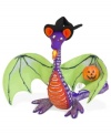 More fun than frightening, this fire-breathing dragon is crafted with traditional Annalee whimsy. A witch's hat does little to disguise his scaly purple body and bat-like wings.