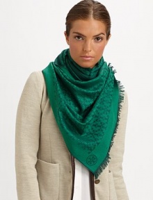 An ultra-cozy, jacquard wool scarf is embellished with logo pattern and eyelash fringe.Merino woolAbout 82 X 25Dry cleanImported An ultra-cozy, jacquard wool scarf is embellished with logo pattern and eyelash fringe.Merino woolAbout 82 X 25Dry cleanImported