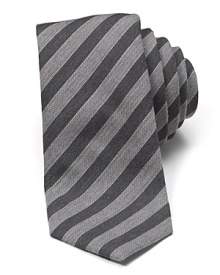 Crafted in a soft wool and silk blend, this handsome textured tie uses muted stripe tones to bring a quiet sophistication to even your casual look. Crafted in a soft wool and silk blend, this handsome textured tie uses muted stripe tones to bring a quiet sophistication to even your casual look.