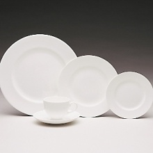 Nothing is more practical and versatile than this hostess' classic. Use it as is or dress it up in glittering metallics or your favorite colors. Bone china. Nothing is more practical and versatile than this hostess' classic. Use it as is or dress it up in glittering metallics or your favorite colors. Bone china.