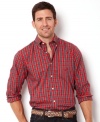 Diversify your shirts as you do your assets with this traditional plaid shirt by Nautica.