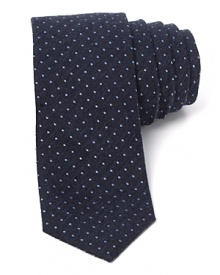 The Loughton Roadster tie combines a slanting textured pindot pattern and a skinny shape for a look that's as slick at the office as it is at the office party. The Loughton Roadster tie combines a slanting textured pindot pattern and a skinny shape for a look that's as slick at the office as it is at the office party.