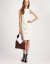 A study in modern minimalism, this elegant shift wraps around the body in a draped silhouette.Jewel neckline Sleeveless Gathered bodice High waist Wrap-front skirt Silk lining About 23 from natural waist Tencel; dry clean Imported