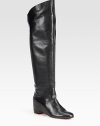 Fine Italian leather forms this exaggerated over-the-knee boot, resting on a hidden wedge. Hidden wedge, 3¼ (80mm)Shaft, 17½Leg circumference, 19Leather upperPull-on style with back slitLeather liningSignature red leather solePadded insoleMade in Italy