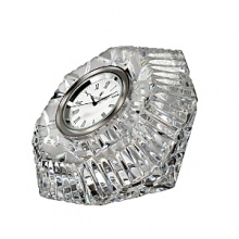 Timeless style for a brilliant time piece: this small crystal clock features the Lismore pattern's diamond-like facets; a gorgeous little display on any desk, mantle or bedside table. Timeless style for a brilliant time piece: this small crystal clock features the Lismore pattern's diamond-like facets; a gorgeous little display on any desk, mantle or bedside table.