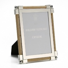 Made entirely from hand, each piece of William Yeoward Crystal draws its inspiration from antique crystal pieces originally made in England during the 18th and early 19th centuries. Traditionally styled and utterly elegant, the Classic Raffia frame is an elegant way to frame your favorite photos. Made entirely from hand, each piece of William Yeoward Crystal draws its inspiration from antique crystal pieces originally made in England during the 18th and early 19th centuries. Traditionally styled and utterly elegant, the Classic Raffia frame is an elegant way to frame your favorite photos.