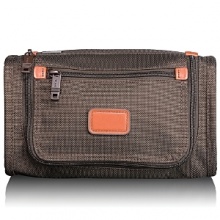 The popular, slim design fits easily into many of Tumi's outside U-zip pockets. Features easy-access opening to interior, webbing handle strap, water-resistant lining. The popular, slim design fits easily into many of Tumi's outside U-zip pockets. Features easy-access opening to interior, webbing handle strap, water-resistant lining.