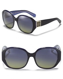 Create daytime drama in deep blue Tory Burch shades.