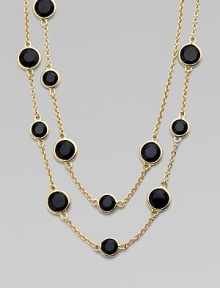 Long chain piece punctuated with round crystals. 12K goldplated metal Length, about 32 Multi-sized round crystals Lobster claw clasp Imported Long chain piece punctuated with round crystals. 12K goldplated metal Length, about 32 Multi-sized round crystals Lobster claw clasp Imported
