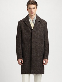 Luxurious wool overcoat with concealed button closure, front welt pockets and a single rear vent, beautifully tailored to be worn over your standard suiting.Button frontWaist welt pocketsRear ventAbout 38 from shoulder to hemWoolDry cleanMade in Italy Luxurious wool overcoat with concealed button closure, front welt pockets and a single rear vent, beautifully tailored to be worn over your standard suiting.Button frontWaist welt pocketsRear ventAbout 38 from shoulder to hemWoolDry cleanMade in Italy