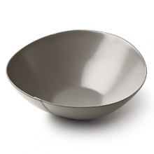 Borrowing from nature, this serving bowl has a highly glossed surface and unusual contours, creating an interesting silhouette - a DVF signature - on the table. Borrowing from nature, this serving bowl has a highly glossed surface and unusual contours, creating an interesting silhouette - a DVF signature - on the table.