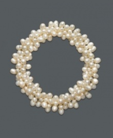 A cluster of pearls at your wrist will help enhance any ensemble. Smooth cultured freshwater pearls (3-1/2 - 4-1/2 mm) will stretch comfortably over the wrist. Approximate diameter: 4 inches.