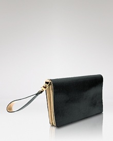 Tusk's sleek accessories are a handbag essential. Perfect practical style with this polished calfskin leather wallet, boasting ample pockets and a versatile wrist strap. Tusk's sleek accessories are a handbag essential. Perfect practical style with this polished calfskin leather wallet, boasting ample pockets and a versatile wrist strap.