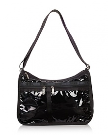 Coated durable rip-stop nylon shoulder/crossbody bag with single adjustable shoulder strap and silvertone hardware. Two front exterior zip pockets and additional back exterior zip pocket. Expandable side gussets with zipper. Two separate compartments, both with top zip closure. Interior zip pocket. Lined. Interior zip pouch included. Coated durable rip-stop nylon shoulder/crossbody bag with single adjustable shoulder strap and silvertone hardware. Two front exterior zip pockets and additional back exterior zip pocket. Expandable side gussets with zipper. Two separate compartments, both with top zip closure. Interior zip pocket. Lined. Interior zip pouch included.
