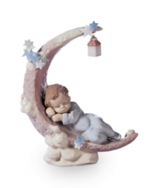 A sleepy little angel snoozes under the stars, in the crook of a crescent moon, in this handcrafted Heavenly Slumber figurine by Lladro. Cute for a child's bedroom. A sleepy little angel snoozes under the stars, in the crook of a crescent moon, in this handcrafted Heavenly Slumber figurine by Lladro. Cute for a child's bedroom.