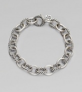 Alternating smooth and cable links create a bracelet that's both classic and of-the-moment with true Yurman style. Sterling silver Length, about 7¼ Spring ring clasp Imported