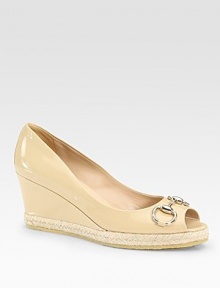 Patent leather wedge with a rope-covered platform, peep toe and buckle adornment. Self-covered wedge, 3 (75mm)Rope-covered platform, 1 (25mm)Compares to a 2 heel (50mm)Patent leather upperLeather liningRubber solePadded insoleMade in ItalyOUR FIT MODEL RECOMMENDS ordering one half size up as this style runs small. Patent leather wedge with a rope-covered platform, peep toe and buckle adornment. Self-covered wedge, 3 (75mm)Rope-covered platform, 1 (25mm)Compares to a 2 heel (50mm)Patent leather upperLeather liningRubber solePadded insoleMade in ItalyOUR FIT MODEL RECOMMENDS ordering one half size up as this style runs small.