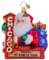 Santa does some sightseeing as he's circling the globe, stopping in at the Chicago Theater in this handcrafted ornament from Christopher Radko. Now showing: My Kind of Town.