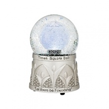 Modeled after the Times Square skyline, this 2012 Waterford snowglobe has a footed silvery base that's etched in a Deco pattern and states Let There Be Friendship. Modeled after the Times Square skyline, this 2012 Waterford snowglobe has a footed silvery base that's etched in a Deco pattern and states Let There Be Friendship.