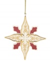 Crafted of lovely porcelain with gold and red embellishments, this star ornament sparkles upon your tree for an opulent look. From Lenox.