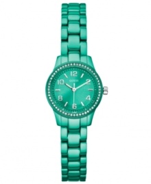 Get vibrant with pops of turquoise! This GUESS watch is crafted with polished aluminum glammed up with unexpected color.