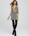 A punchy graphic print makes waves on the DIANE von FURSTENBERG Moriko dress, stunningly modern yet vaguely retro.