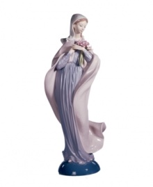 Cloaked in soft pastels and clutching a pink bouquet, the Lady with Flowers figurine from Lladro has an air of quiet elegance in handcrafted porcelain. Cloaked in soft pastels and clutching a pink bouquet, the Lady with Flowers figurine from Lladro has an air of quiet elegance in handcrafted porcelain.