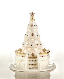 A new holiday destination for Mistletoe Park villagers, this beautiful Christmas tree is a beacon of light in the quaint porcelain town. Gold trimmings, red and green ornaments and a festive sprinkle of gold glitter give it that special holiday feel. A new holiday destination for Mistletoe Park villagers, this beautiful Christmas tree is a beacon of light in the quaint porcelain town. Gold trimmings, red and green ornaments and a festive sprinkle of gold glitter give it that special holiday feel.